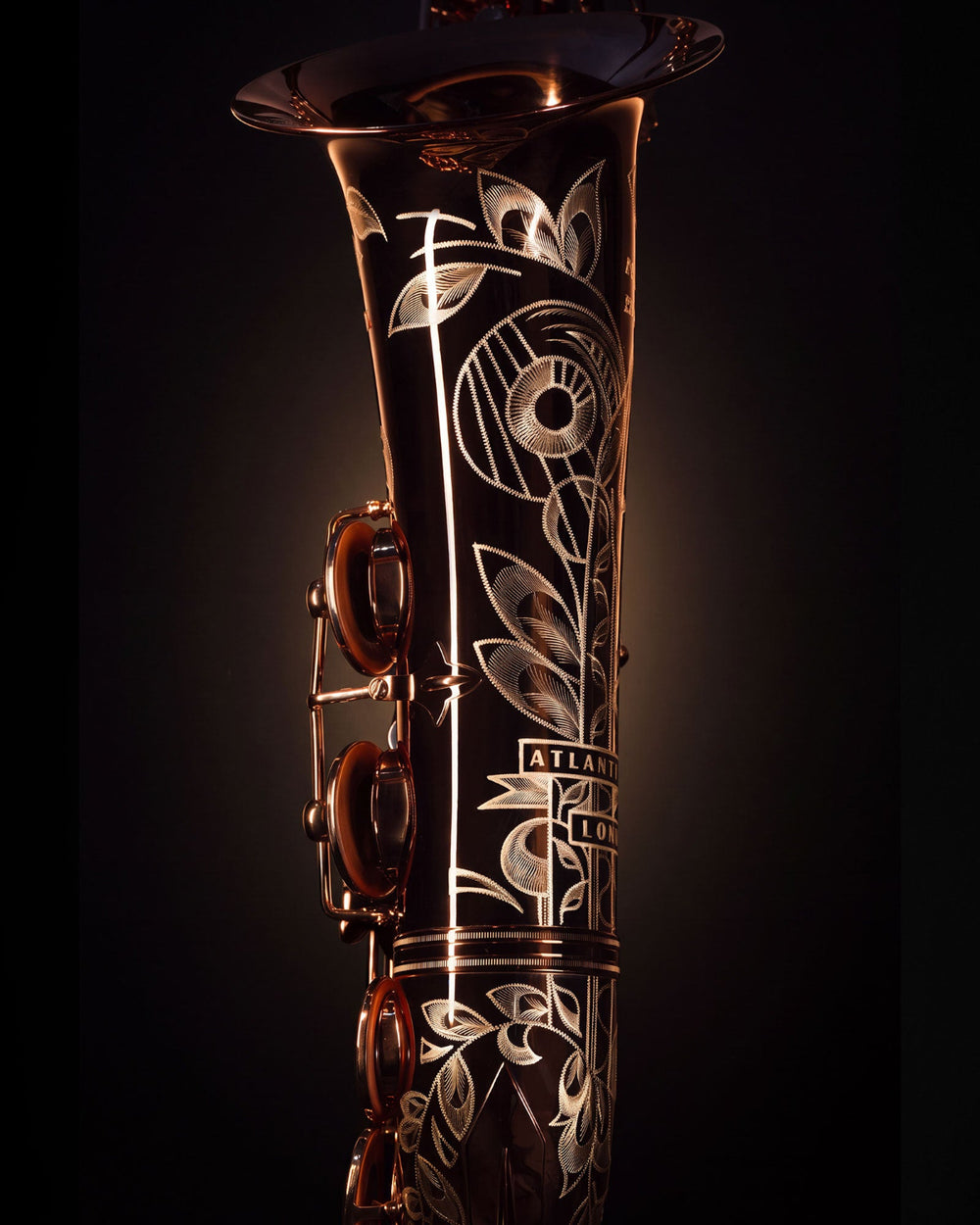 Hand-engraved floral detail on the bell of The Duke saxophone
