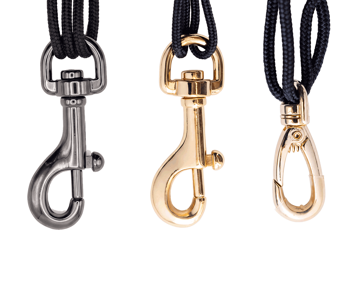 Belgravia metal snap and clip hooks in black nickel and gold-coloured finishes with protective contact coverings